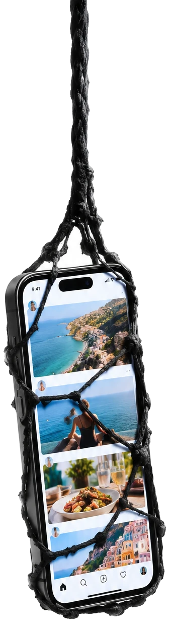 A phone showing a social media feed, hanging from a strand of spider web
